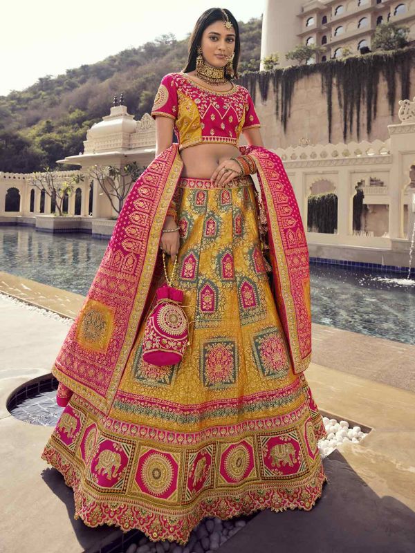 Golden Colour Designer Wedding Lehenga Choli in Fancy Fabric.