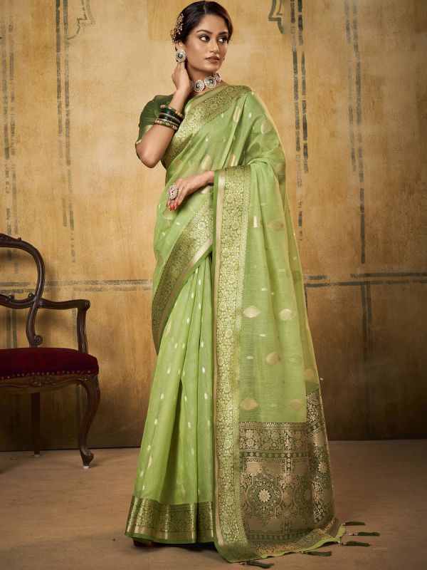 Green Zari Woven Party Wear Saree In Tissue
