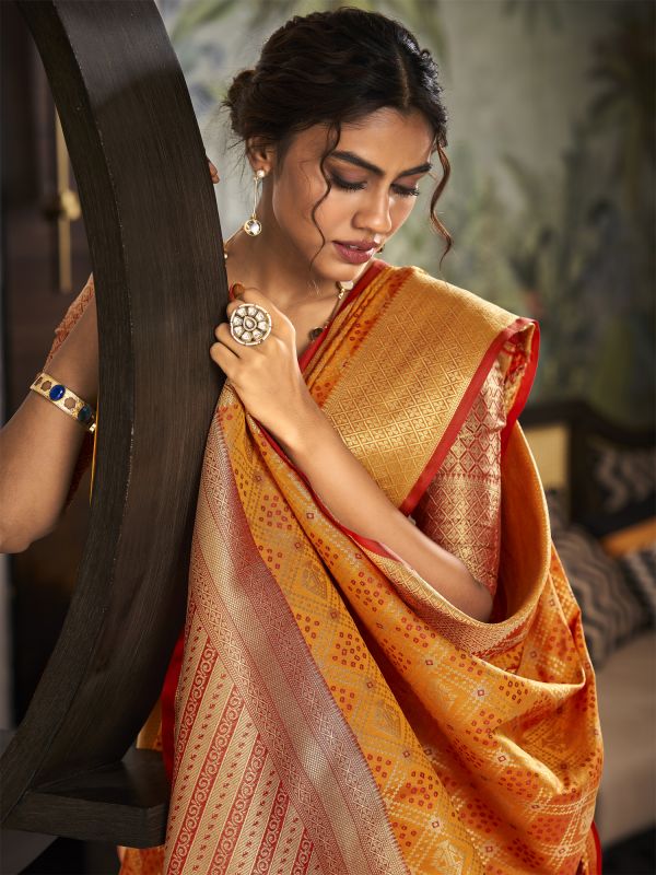 Orange Traditional Wear Saree In Patola Silk