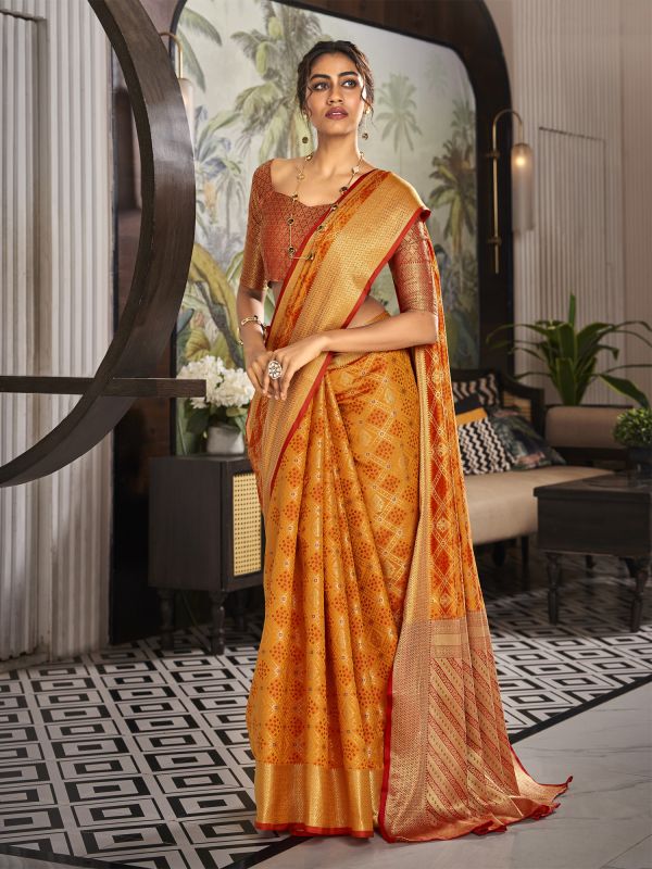 Orange Traditional Wear Saree In Patola Silk