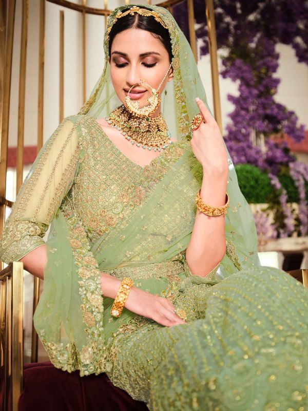 Green Bridesmaid Embroidered Lehenga Choli In Net