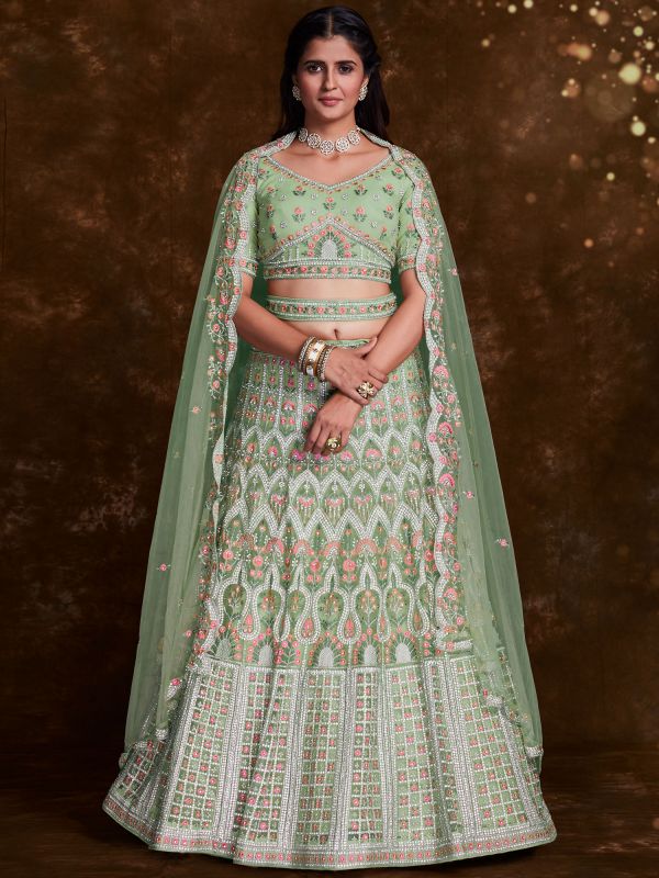 Green Embroidered Wedding Wear Lehenga In Net
