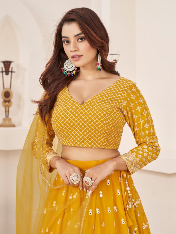 Mustard Yellow Mirror Embellished Lehenga Choli In Georgette