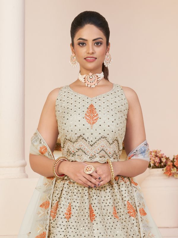 Light Cream Sequins Embroidered Lehenga With Blouse In Net