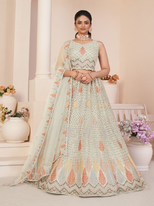 Light Cream Sequins Embroidered Lehenga With Blouse In Net