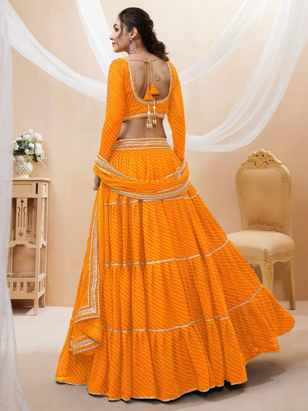 Yellow Georgette Lehenga Choli In Traditional Lehariya Print