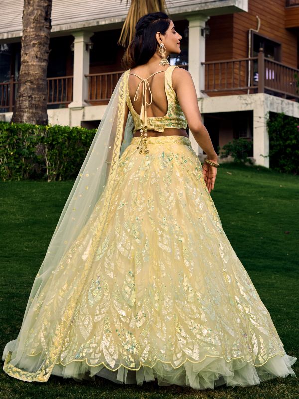 Corn Yellow Net Lehenga Choli In Sequins Embroidery