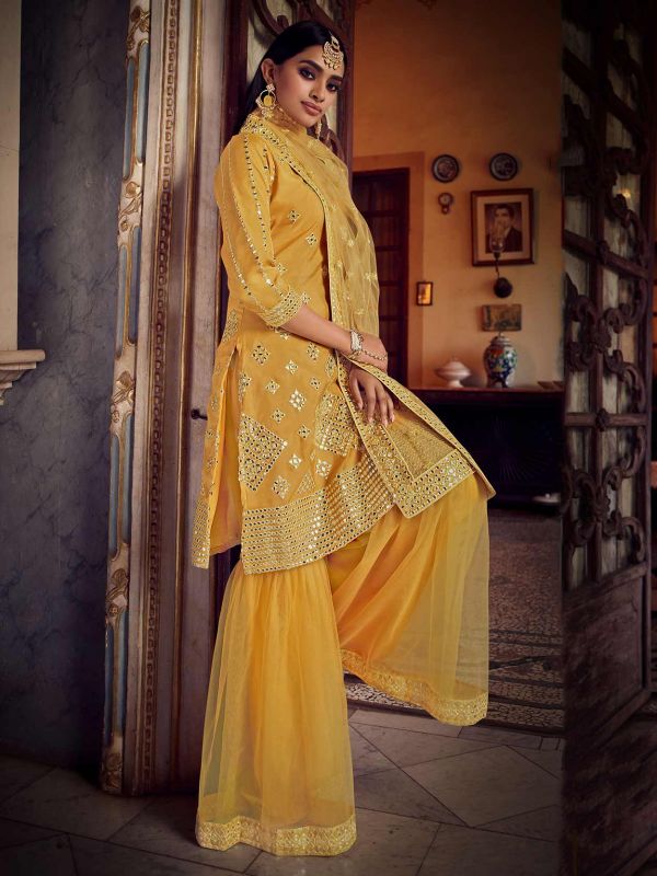 Mustard Yellow Colour Sharara Salwar Suit in Organza Fabric.