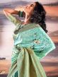 Turquoise Woven Satin Saree In Floral Print