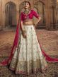 White Embroidered Wedding Wear Lehenga In Rayon