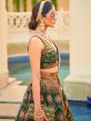 Green Wedding Wear Sequined Lehenga In Silk