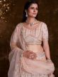 Peach Stone Work Lehenga Choli In Net