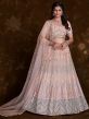 Peach Stone Work Lehenga Choli In Net