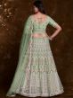 Green Embroidered Wedding Wear Lehenga In Net