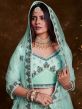 Turquoise Stone Embroidered Lehenga Choli In Net