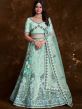Turquoise Stone Embroidered Lehenga Choli In Net