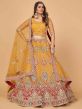 Mustard Yellow Colour Net Fabric Women Lehenga Choli.