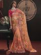 Orange Floral Motif Embellished Saree In Net