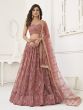 Mauve Sequins Embroidered Net Lehenga Choli