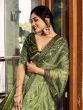 Moss Green Sequins Embellished Lehenga Choli In Chinon Silk