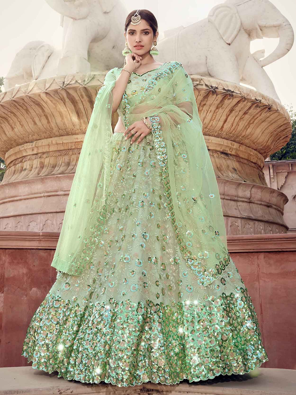 Pista Green Colour Net Wedding Lehenga.