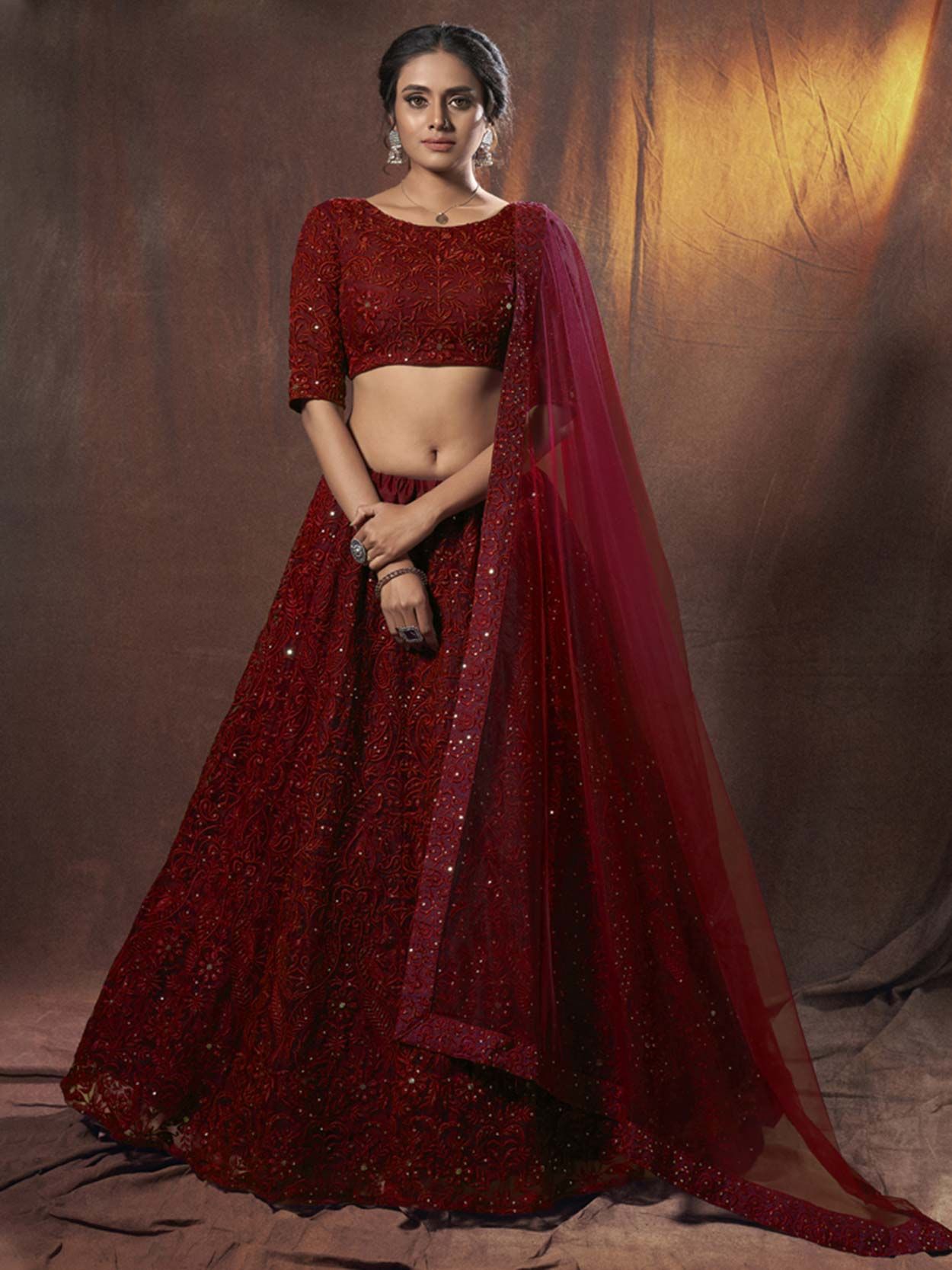 Maroon Colour Net Bridal Lehenga Choli.