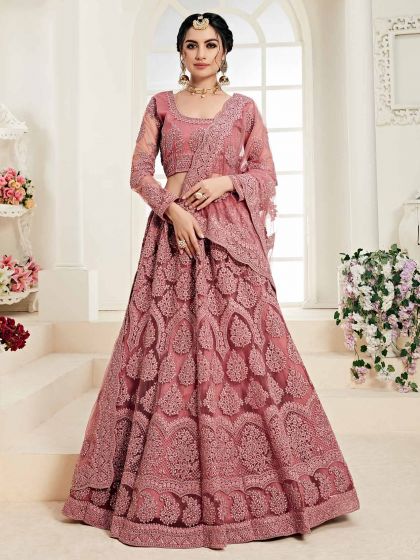 Classy Rust Colour Net Designer Lehenga Choli.