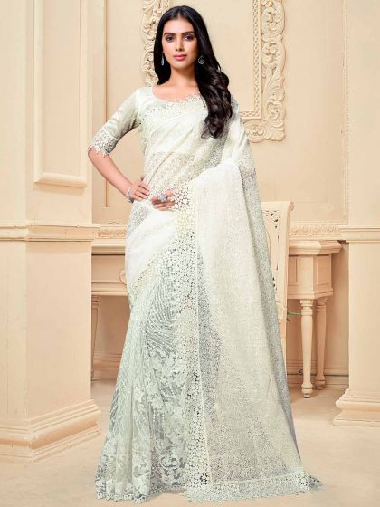 Cream Colour Fancy Saree For Women.