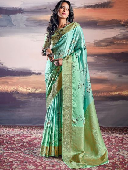 Turquoise Woven Satin Saree In Floral Print