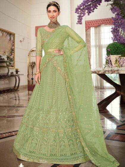 Green Bridesmaid Embroidered Lehenga Choli In Net
