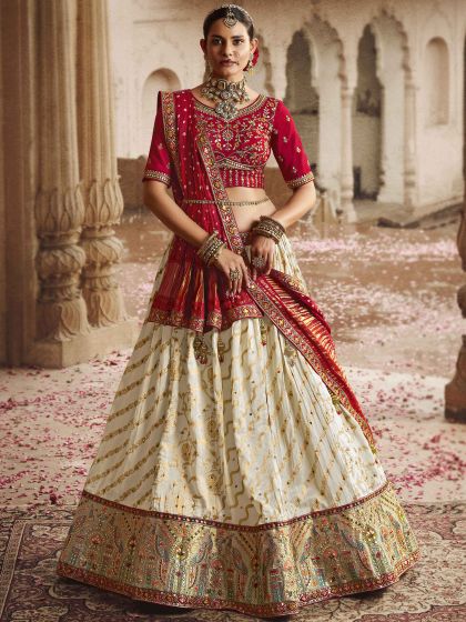 White Heavy Border Bridal Lehenga In Rayon