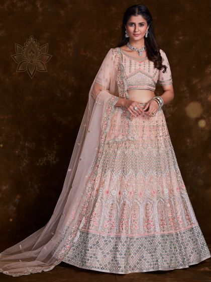 Peach Stone Work Lehenga Choli In Net