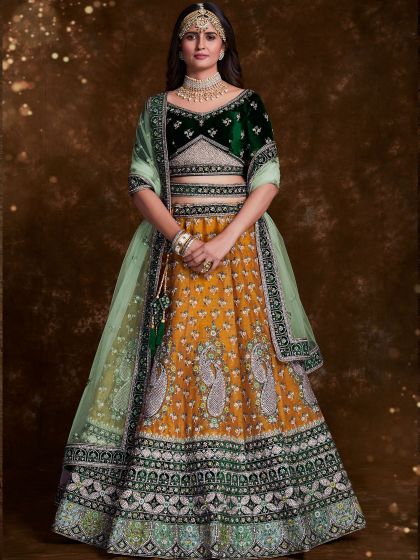Yellow Wedding Wear Lehenga With Velvet Blouse