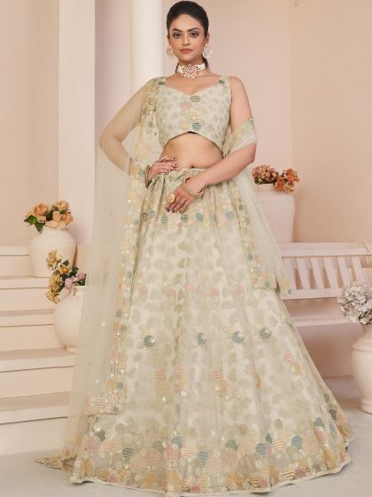 Cream Embroidered Lehenga Choli With Net Dupatta